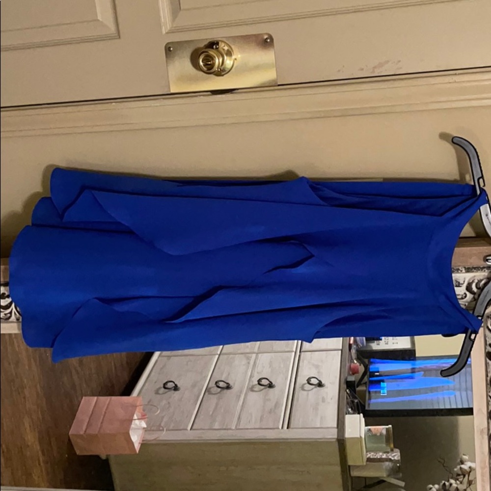 Blue dress, ruffle down front